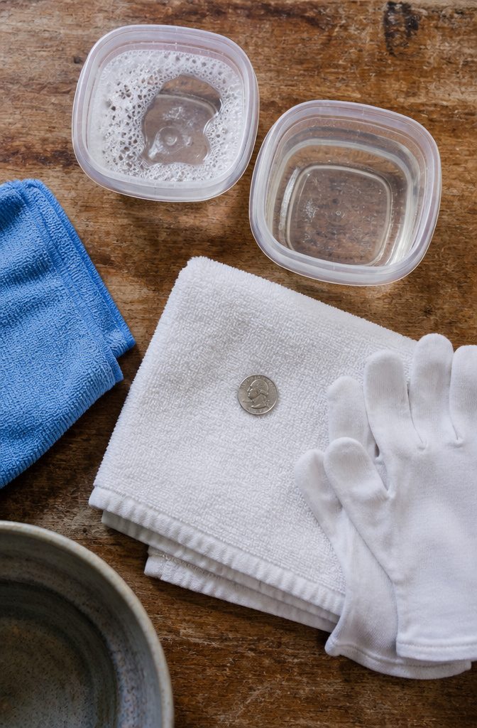 How to Clean Quarters in 5 Steps Without Damage 3 Quarter with distilled water mild dish soap and a folded towel